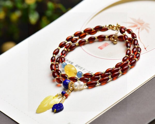 Natural Blood Pearl Rice Bead Bracelet, with a Blood Pearl size of approximately 4 * 6mm2410089634