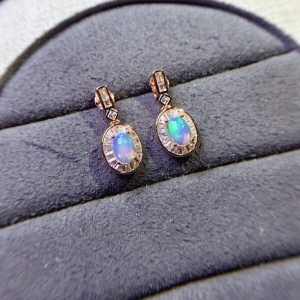wsxc1698953632472_0 Pure natural dazzling white opal earrings, with a main stone size of 4 * 6mm0211110156