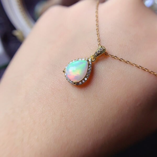 wsxc1698956220299_0 Pure natural dazzling white opal pendant, with a main stone size of 8 * 10mm0211160147